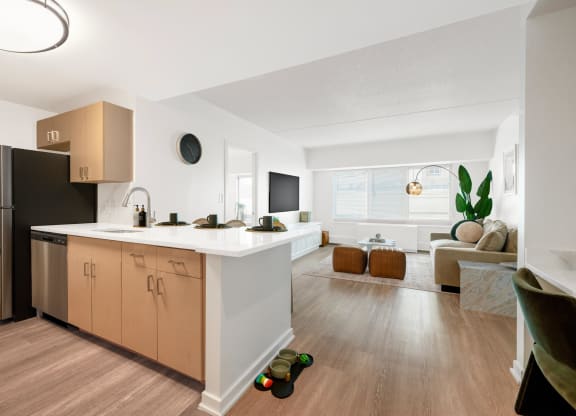 an open kitchen and living room in an apartment