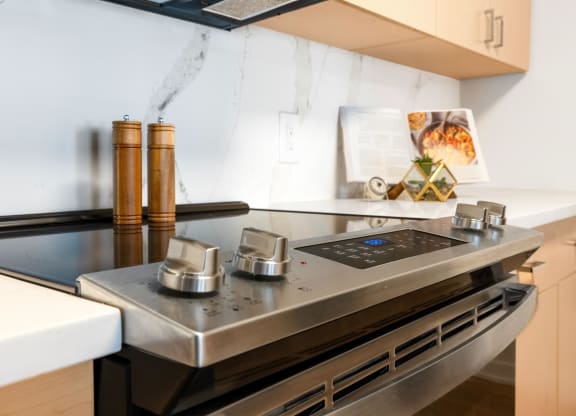 a kitchen with a stove and a sink