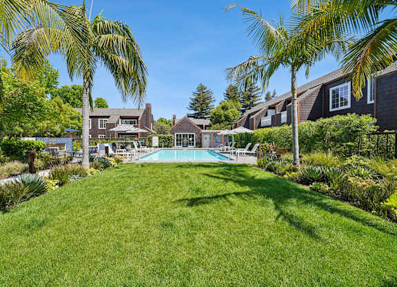 Grove Apartments pool deck designed for relaxing and poolside seating