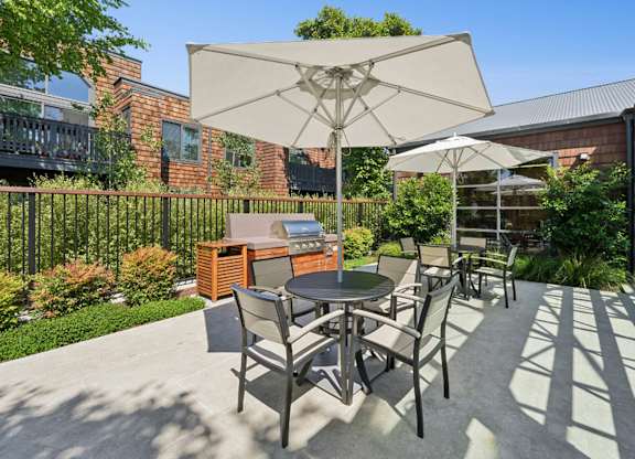 Community grills with patio space for outdoor dining