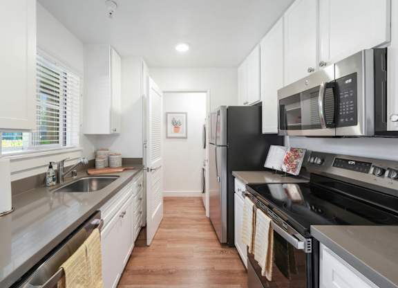 Luxury kitchen interior with modern finishes and built-in appliances
