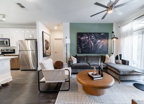 a living room with a couch and a table