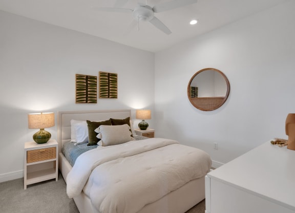 a bedroom with a bed and a ceiling fan at Marisol, Florida