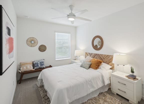 Bedroom with ceiling fan included in 3-bedroom rental home at Martinique