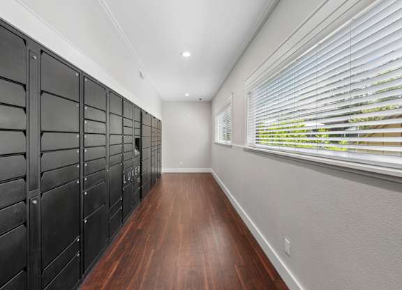 Secure package and mail room at Old Orchard Apartments.