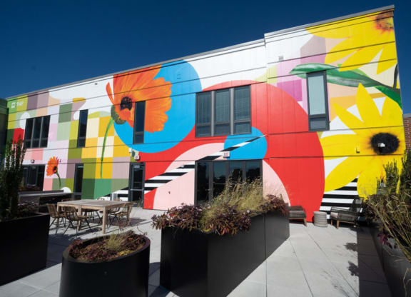a colorful mural on the side of a building