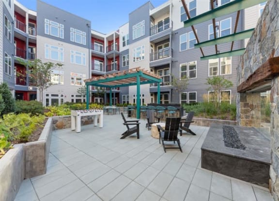 Outdoor Lounge Area With Fireplace at Cameron Square, Alexandria, Virginia