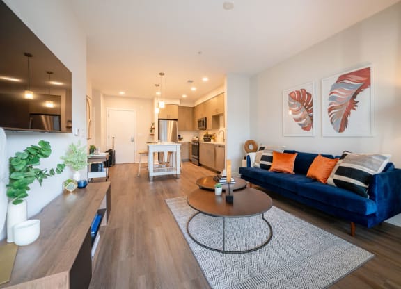 a living room with a couch and a table