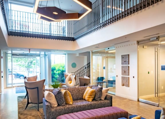 a living room with couches and a table