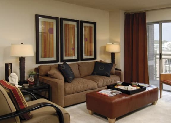 a living room with a couch and a table