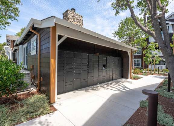 outdoor package lockers near courtyard walkway