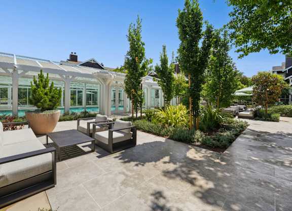 outdoor seating area with landscaped surroundings