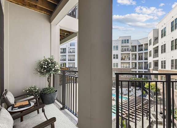 Balcony with view of pool