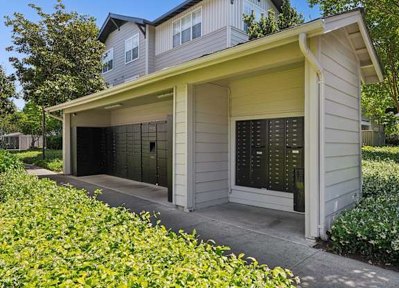 A house with a garage and a driveway.