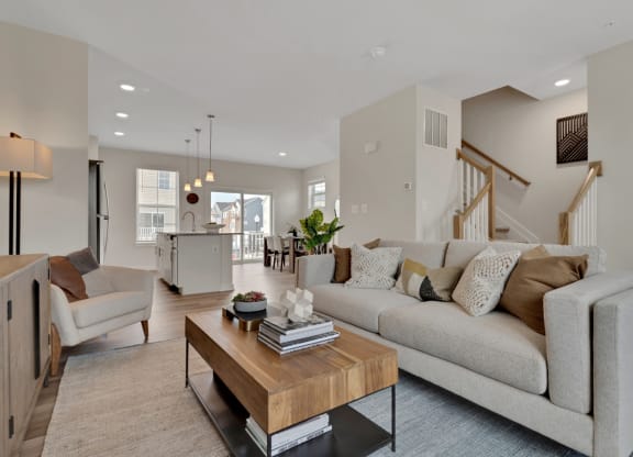 Living room with view of kitchen and stairs at Brandywine Crossing, Brandywine, MD 20613