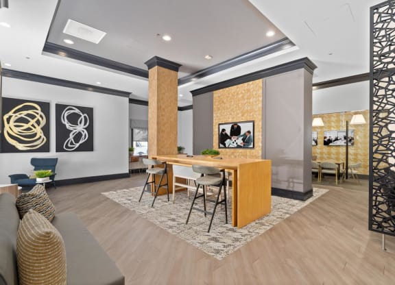 a dining room with a table and chairs in a lobby