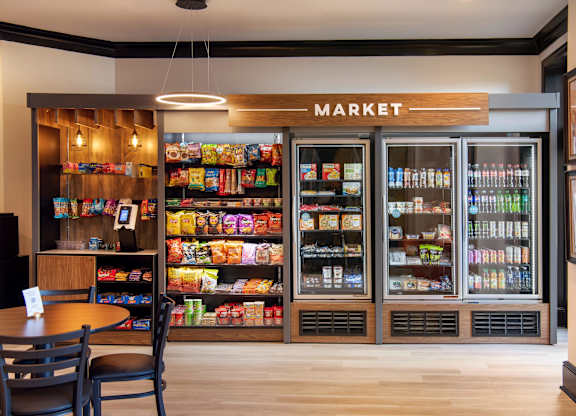 A market with a variety of snacks and drinks on display.