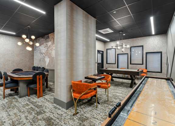 Game room with shuffle board and air hockey
