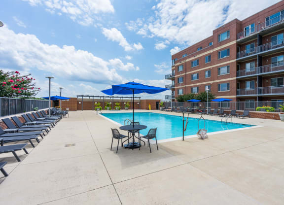 our apartments offer a swimming pool with chairs and umbrellas