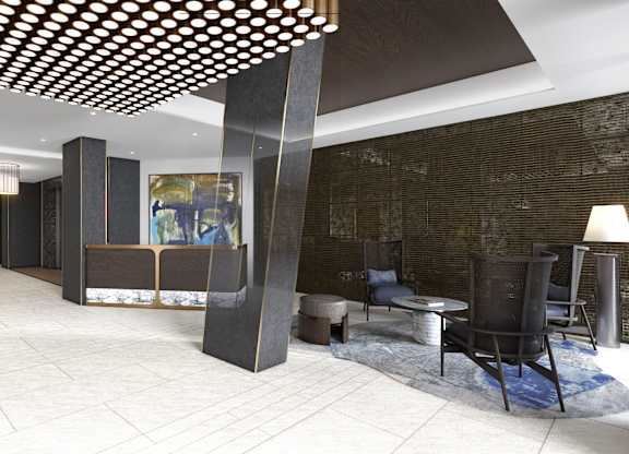 A modern living room with a stone wall and a wooden ceiling.