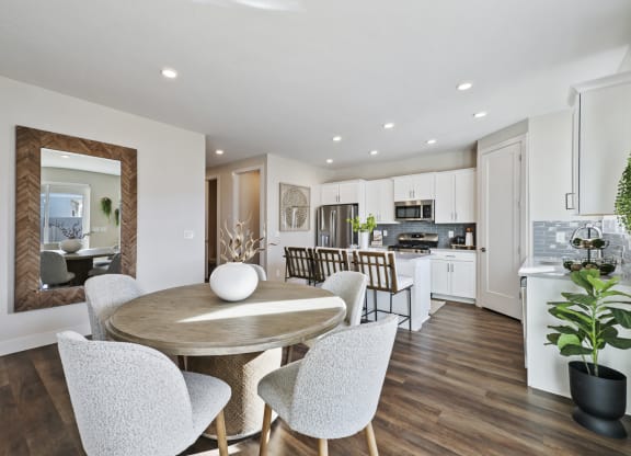 Dining room and kitchen area furnished