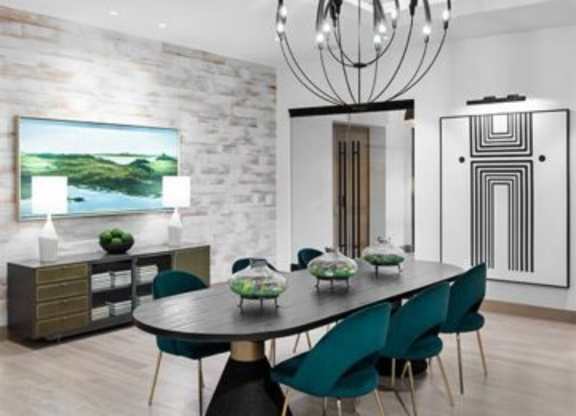A modern dining room with a large table and chairs.at 198 Milltown Apartments, Burlington, NC  