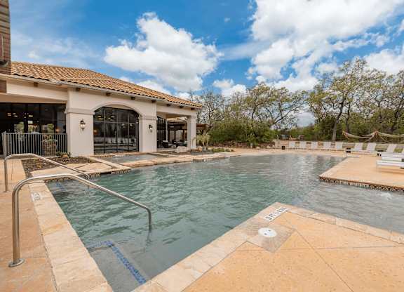 Shimmering pool view at Pecan Springs, San Antonio, 78249