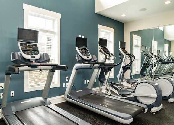 A row of treadmills in a gym. at Concord Ridge Apartments, Concord, NC, 28027