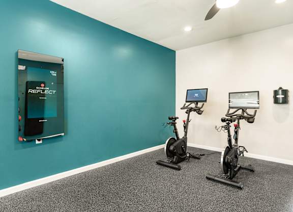 two exercise bikes at WildForest Apartments, Birmingham, AL