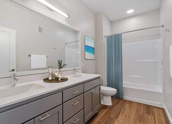 modern bathroom with soaking tub at The Hallon Apartments, Hopkins MN, 55343