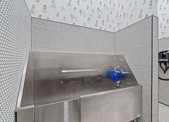 a stainless steel sink in pet spa at The Hallon Apartments,  Hopkins, MN, 55343