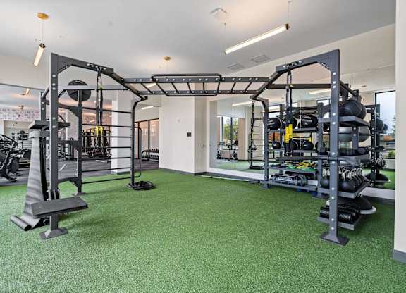 Fitness Center with bodyweight machines at The Hallon Apartments,  Hopkins, MN, 55343