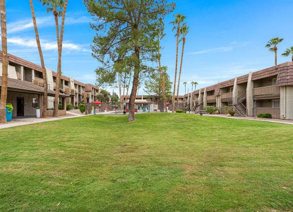 Verde Apartments buildings with grass in front. Tucson, AZ, 85719