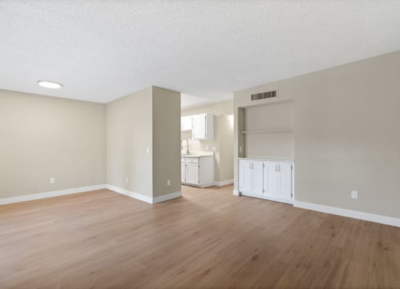 Kitchen and Living Room Area with no furniture at Verde Apartments, Tucson, AZ and a kitchen