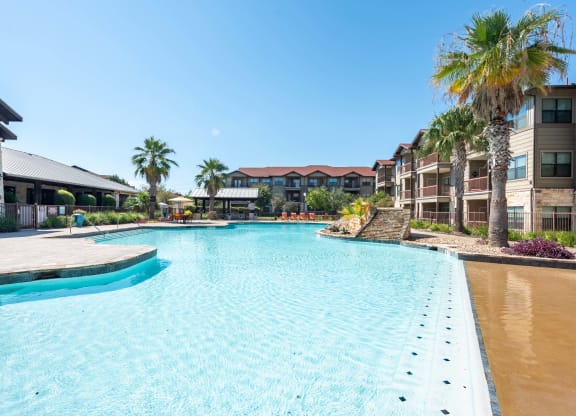 Legacy Brooks Swimming Pool with Palm Trees  at Legacy Brooks, 78223