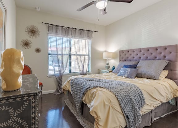 Bedrooms with Ceiling Fan, Large Window and Dresser  at Legacy Brooks, San Antonio, 78223