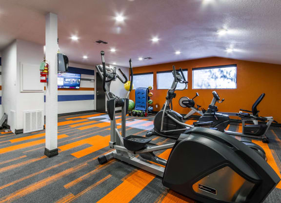 the gym is equipped with treadmills and other exercise equipment at Sundance and Sausalito Apartments, College Station