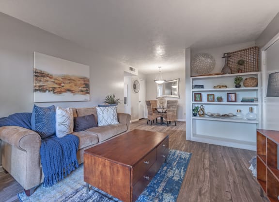 Living room with a couch and a coffee table  at Riverstone, Texas, 77802