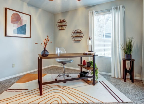 Home office with a ceiling fan and a window  at The Wick, College Station, Texas