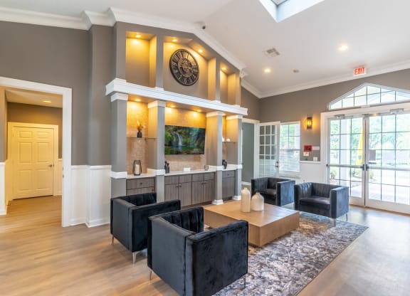 a living room with couches and a table