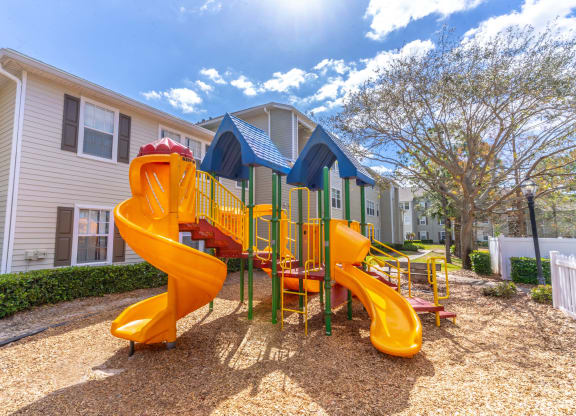 the playground at the flats at big tex apartments