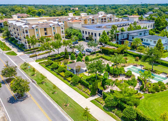 A bird's eye view of a residential area with apartment building