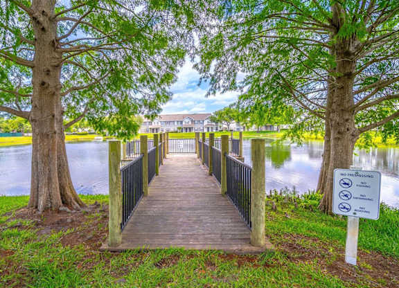 A wooden boardwalk to lake dock