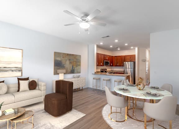 A modern living room with a dining area and kitchen in the background.