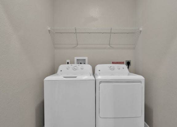 a washer and dryer in a laundry room