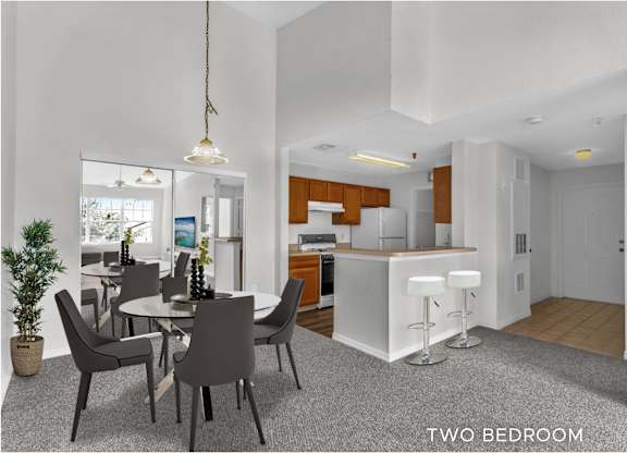 A two bedroom apartment with a dining area and kitchen.