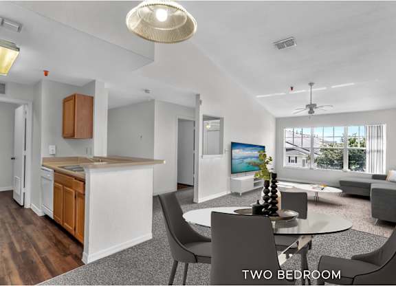 A two bedroom apartment with a kitchen and living room.