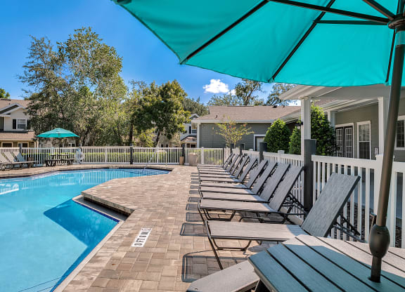 Relaxing Pool And Outdoor Entertainment Area
