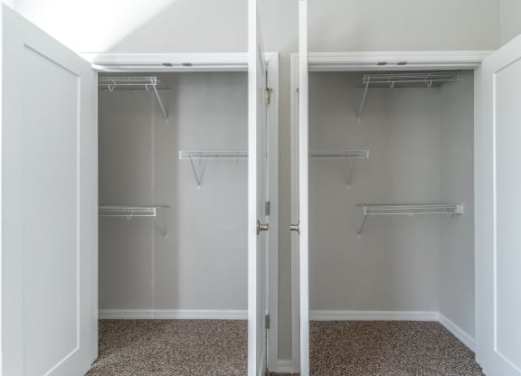 a walk in closet in a 555 waverly unit