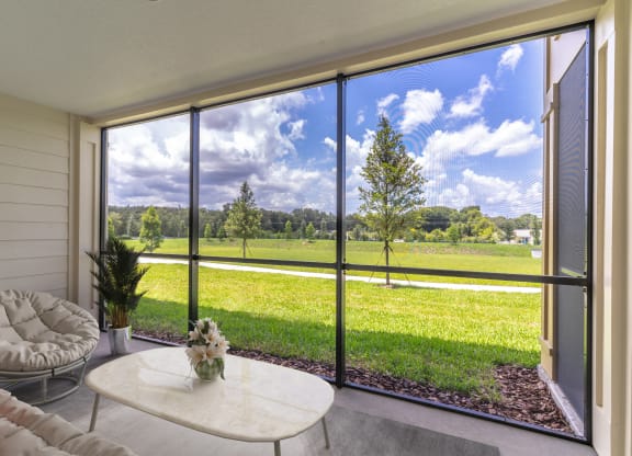 a screened patio with a view